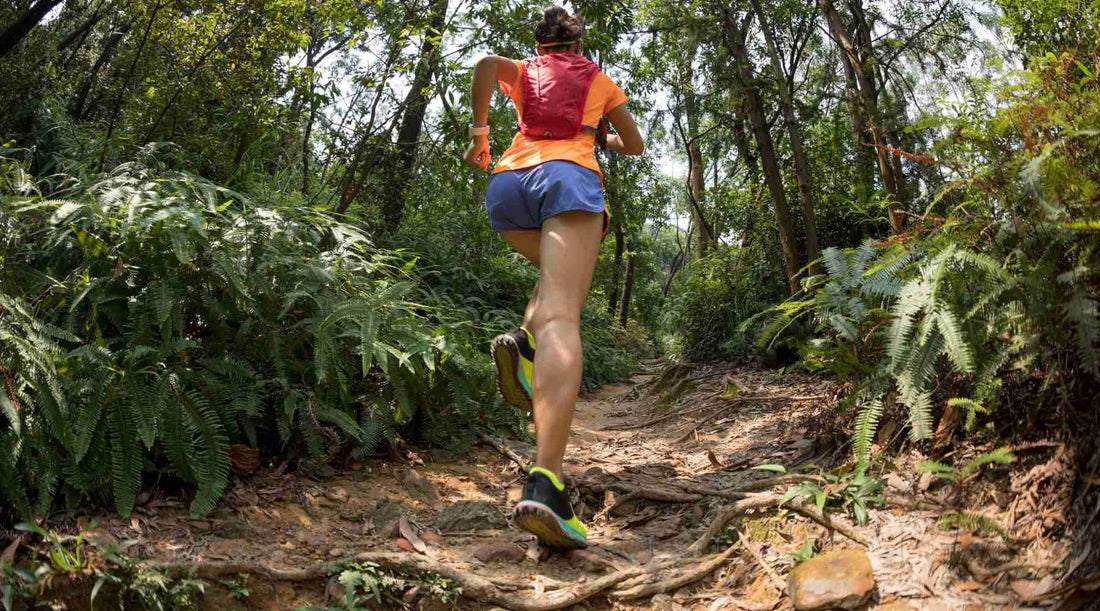 A women who knows the healthy benefits of running with pelanir barefoot shoes in the nature. 