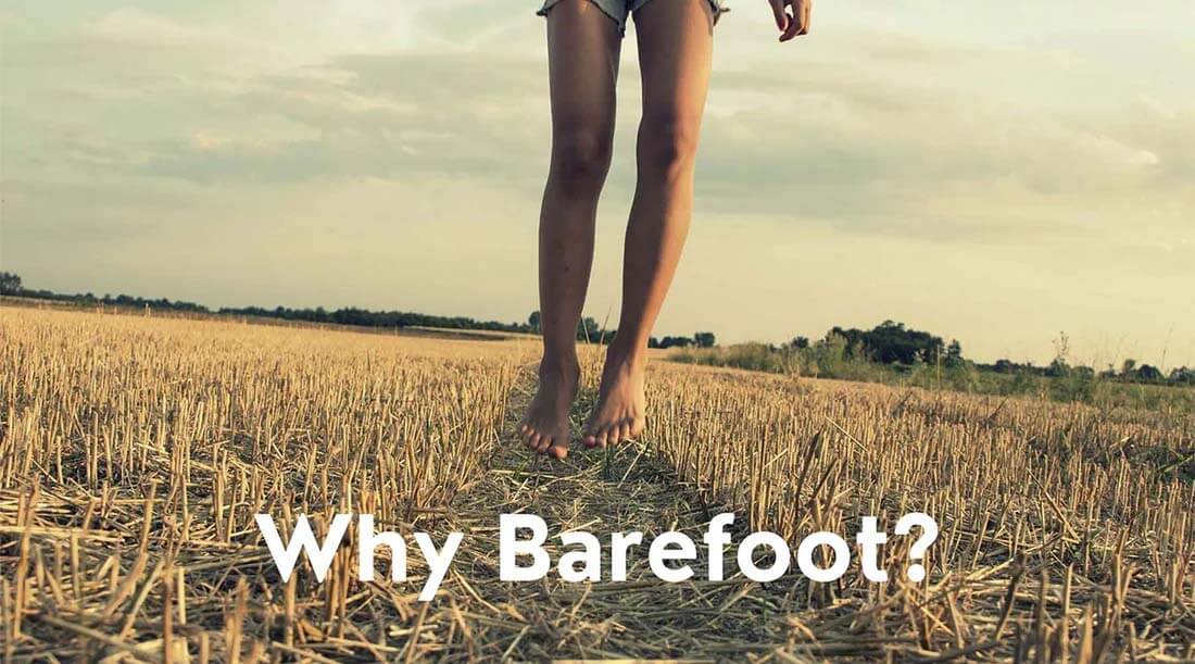 Person standing barefoot in a field with the text 'Why Barefoot?