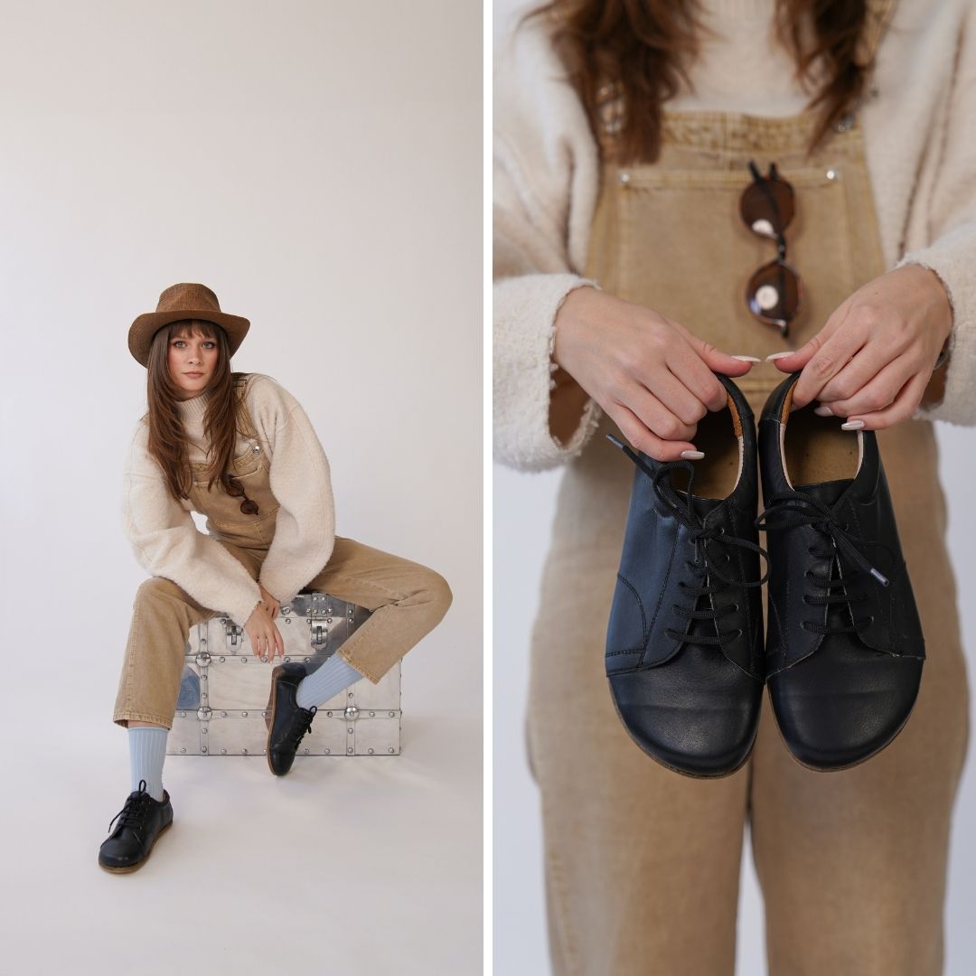 Model seated with black Lydia Leather Barefoot Women's Sneakers, highlighting comfort and style with an autumn outfit.