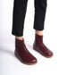 Women’s burgundy boots crafted with a wide toe box, ergonomic soles, and minimal design, ideal for earthing.