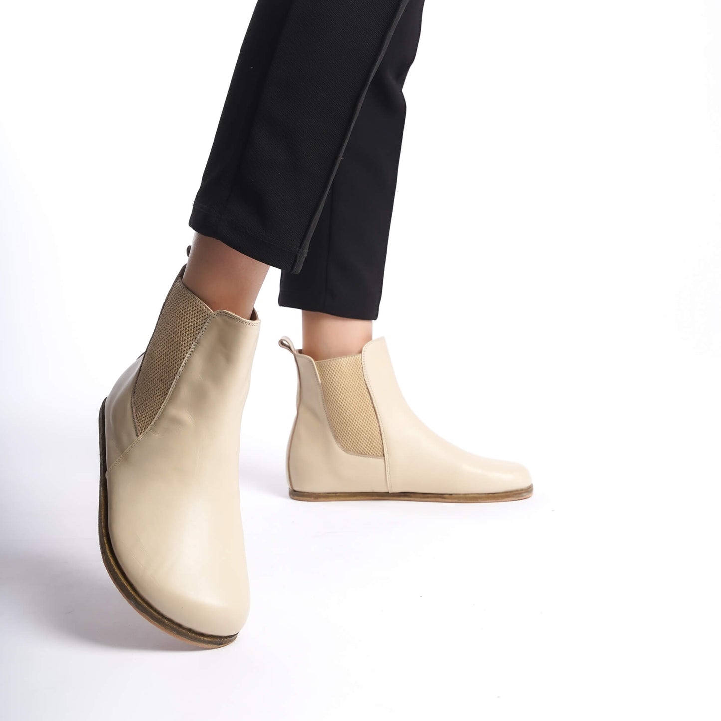 Women's cream Chelsea boots made from high-quality natural leather. Wide toe box design for superior comfort and minimal style.