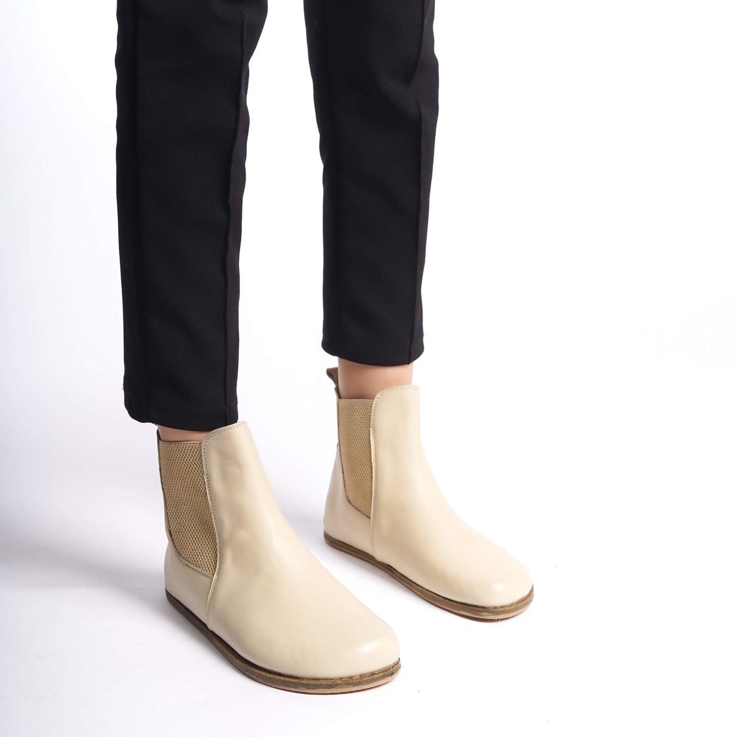 Cream-colored natural leather Chelsea boots with a wide toe box for women. Combining minimalist design with maximum comfort.