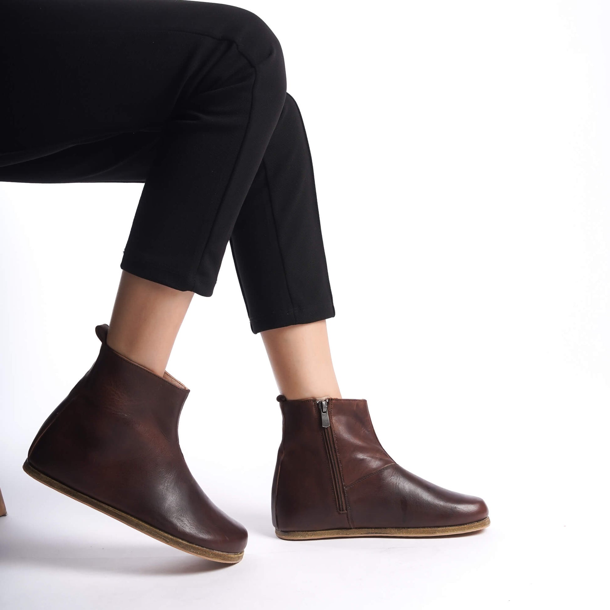 Stylish tan brown leather boots for women, featuring a wide toe box and ergonomic soles. Perfect minimalist design for natural walking and earthing.