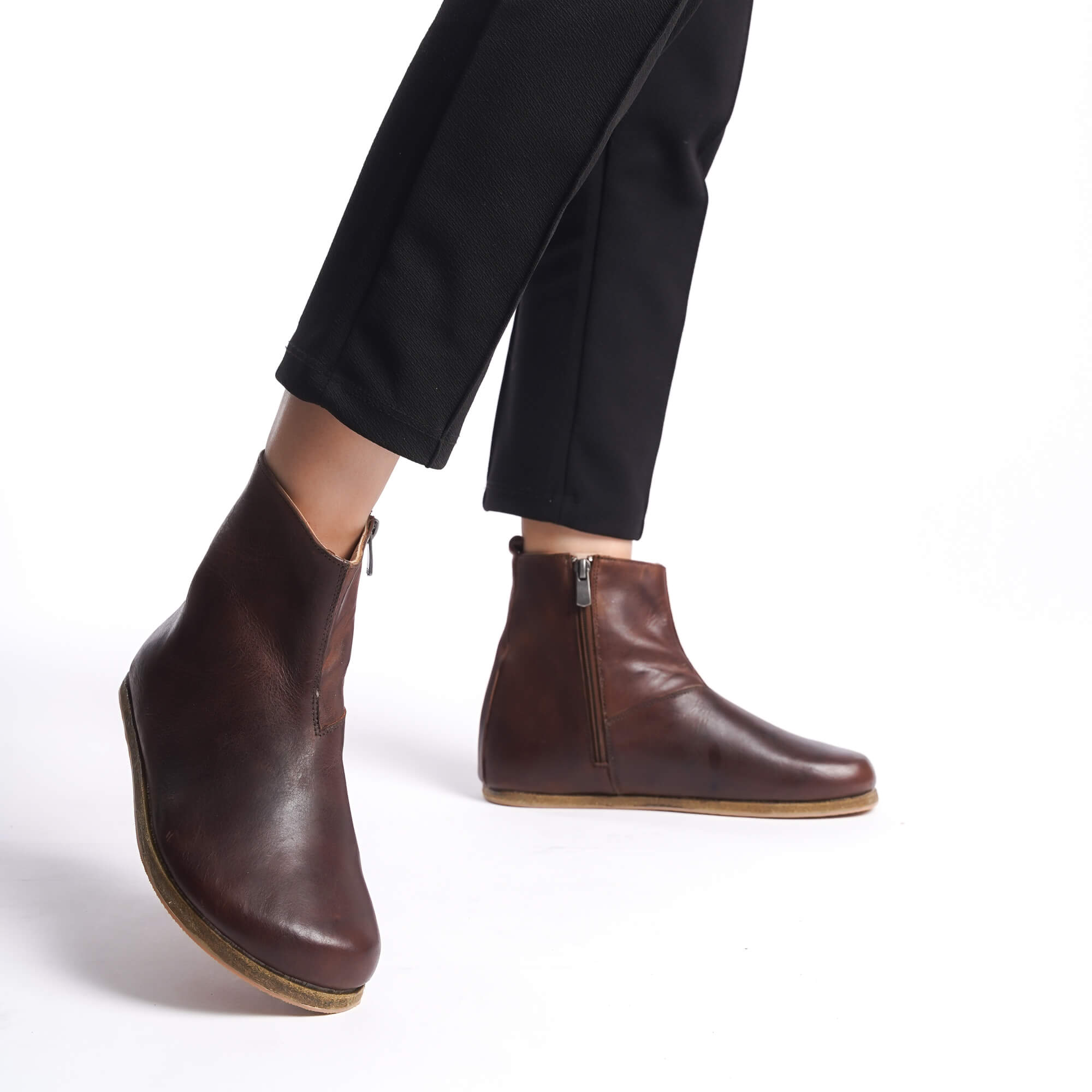 Women's tan brown wide boots with ergonomic soles. Combining a minimalist design with the benefits of earthing shoes, these boots provide ultimate comfort.