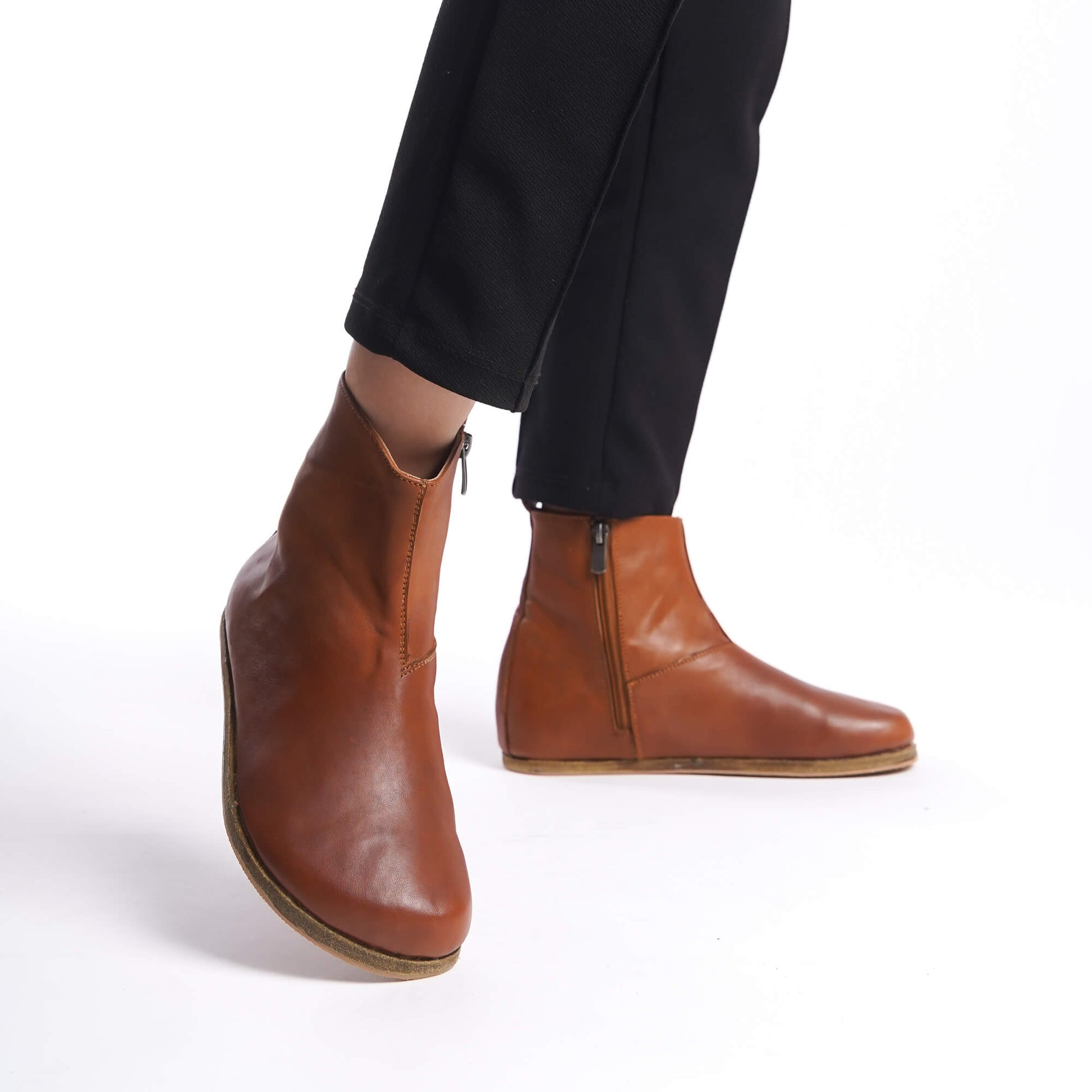 Women’s tan brown wide boots with ergonomic soles. Perfect for those seeking minimalist design and earthing comfort.