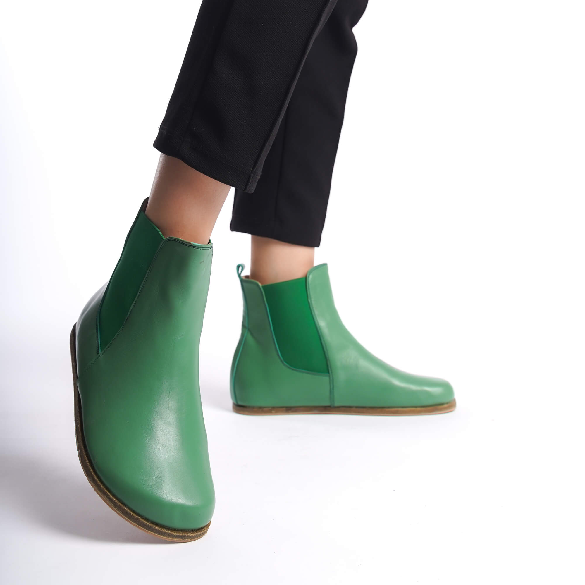 Women's green Chelsea boots designed with a wide toe box, crafted from high-quality natural leather. Combining elegance with comfort.
