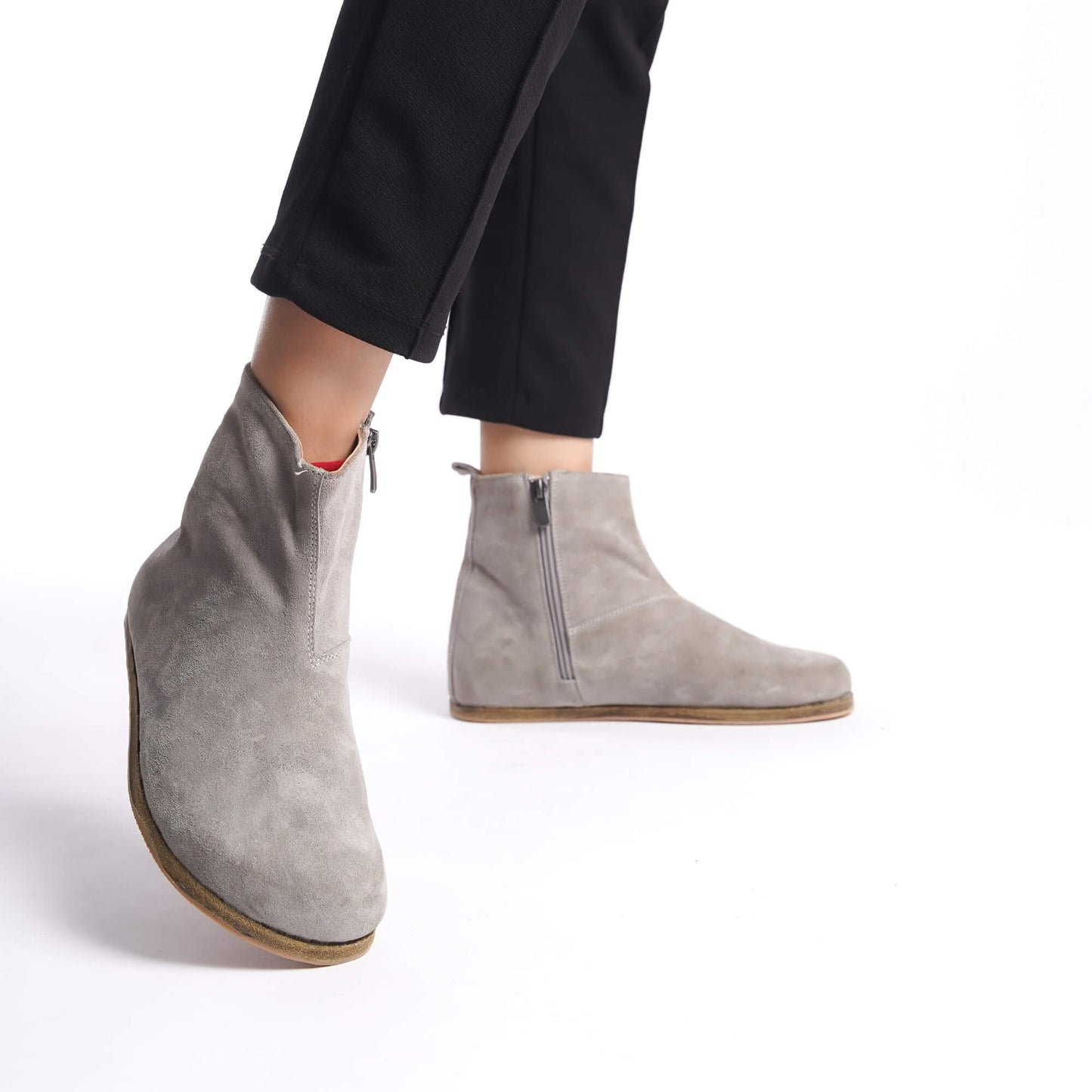 Women’s gray suede boots crafted with a wide toe box, ergonomic soles, and minimal design, ideal for earthing.