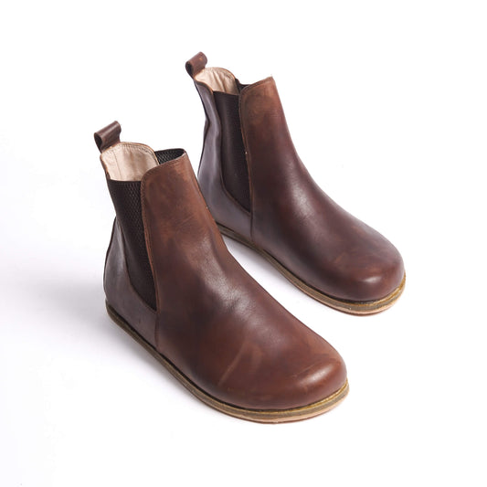 Brown Chelsea boots for women with a wide toe box, made from natural leather. Perfect for a stylish minimalist look and comfort.