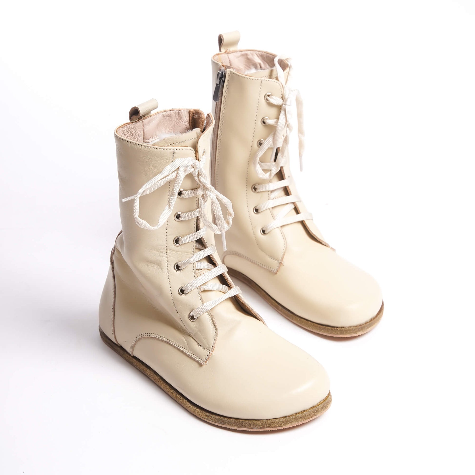 High ankle barefoot winter women's boots in cream, made from genuine natural leather. Combining style and comfort with every step.