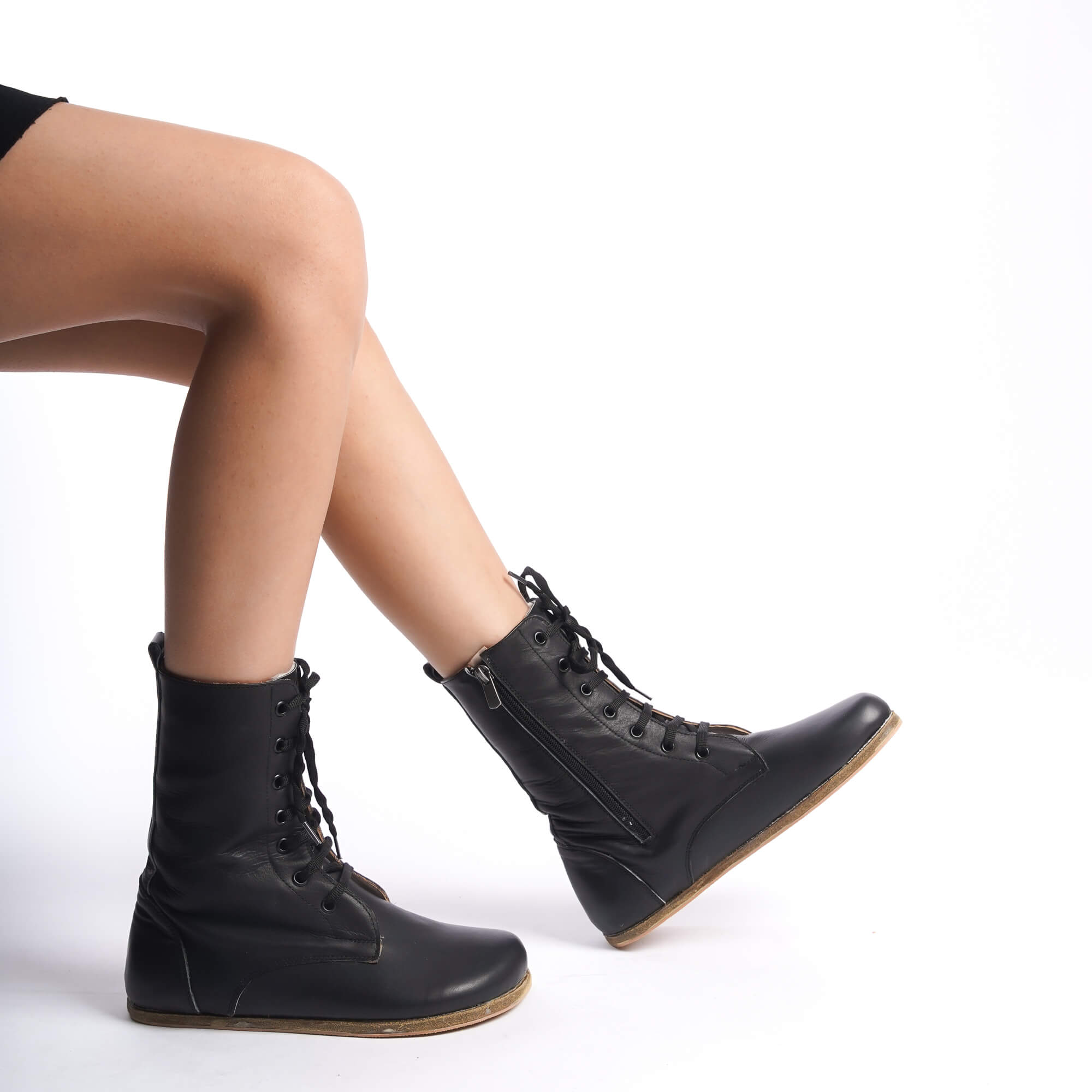 Women’s high ankle lace-up boots made from genuine natural leather in black. Lightweight and flexible sole for maximum comfort.