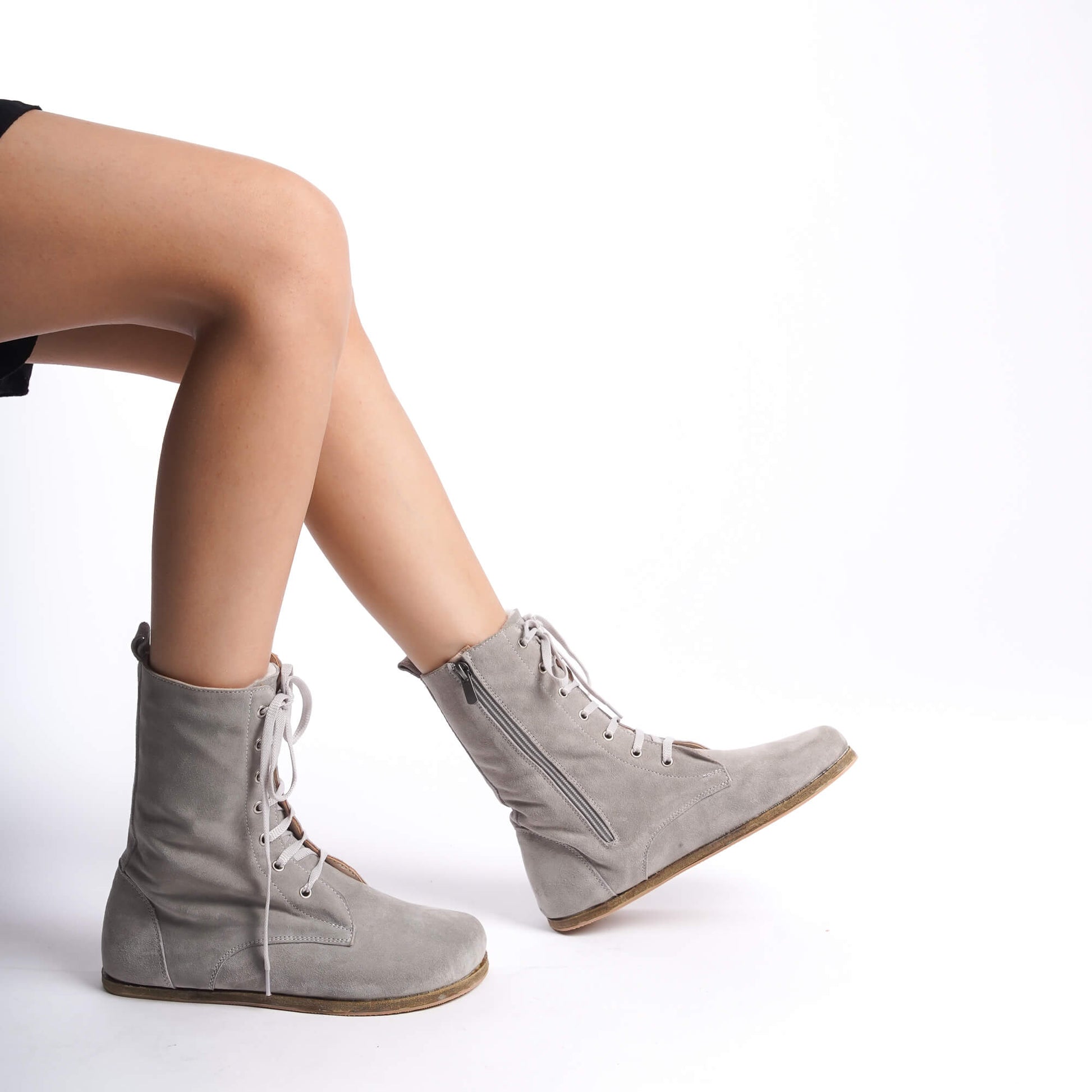 Gray suede women's boots crafted from genuine natural leather.