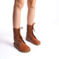 Tan brown women’s boots designed with genuine natural leather. Lace-up and side zipper design offers both practicality and elegance.