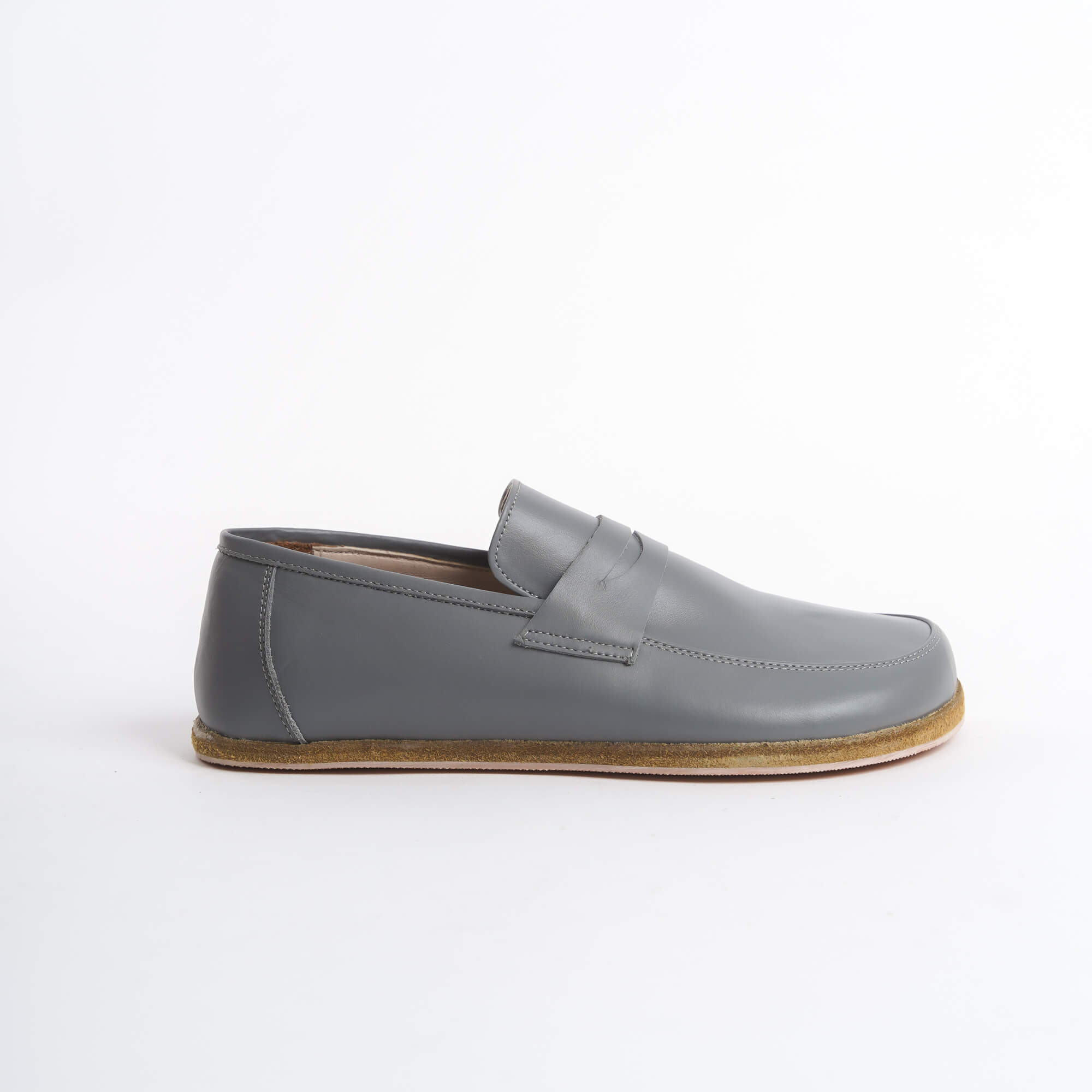 Close-up of Pelanir Sardis gray full-grain leather barefoot penny loafers. Designed for foot freedom with a wide toe box, ultra-thin sole, and premium craftsmanship.
