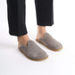 Sophisticated gray suede leather slip-on shoes featuring a cozy cork sole, perfect for women’s versatile wardrobes. These sustainable shoes offer lasting comfort and are a must-have for stylish U.S. shoppers.