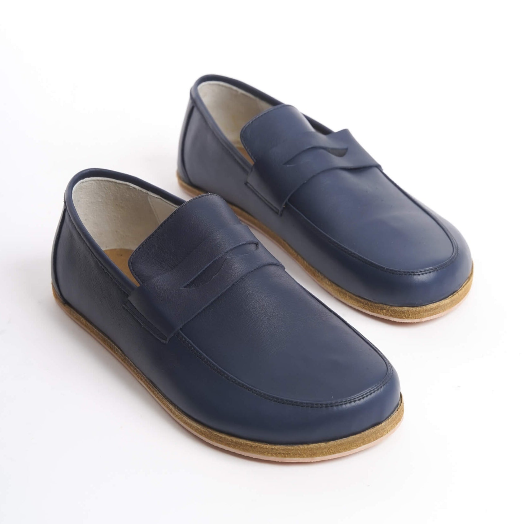 Pelanir Sardis navy blue full-grain leather barefoot penny loafers. A minimalist zero-drop design that offers natural movement and timeless sophistication.