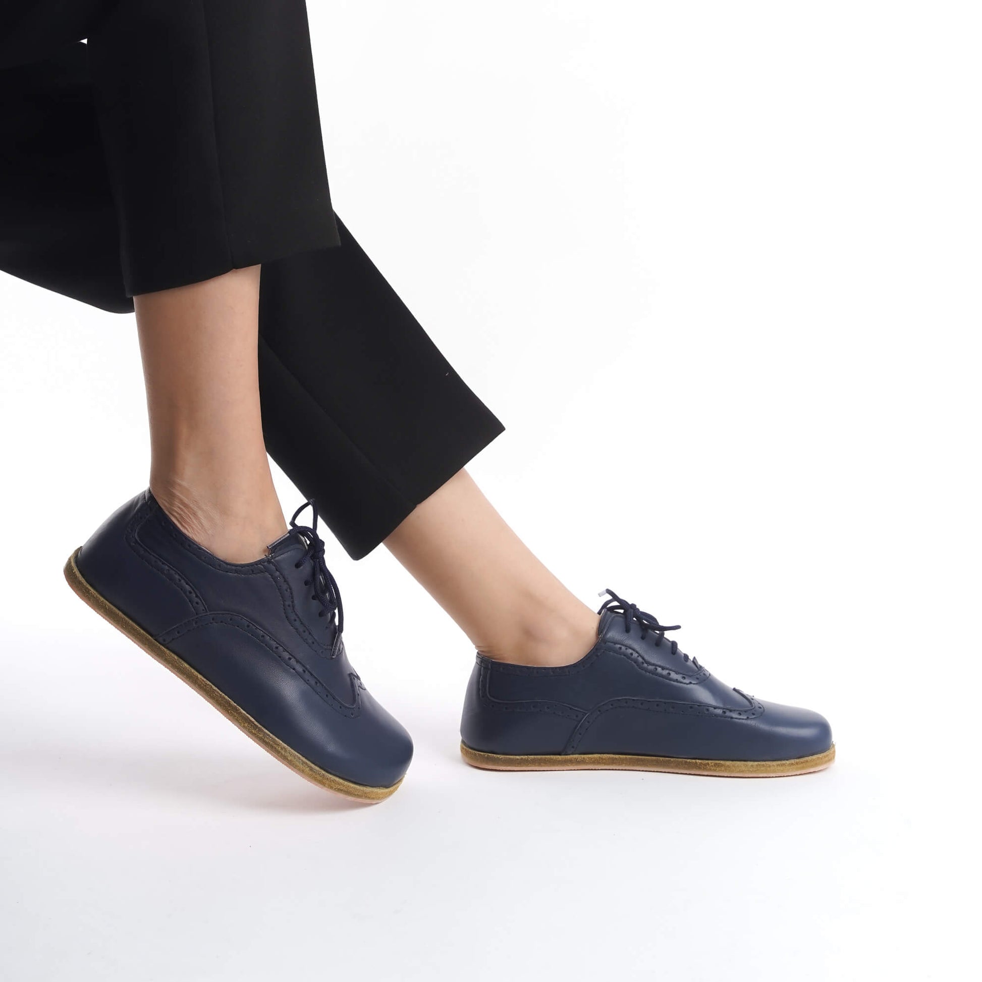 Close-up view of Doris Leather Barefoot Women's Oxfords in Navy Blue, perfect for elegant outfits