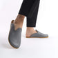 Chic gray leather slip-on shoes for women, crafted with a natural cork sole for excellent arch support. These durable, breathable shoes are a trendy yet eco-conscious choice for everyday style in the USA