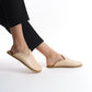 Luxurious cream leather slip-on shoes for women, featuring a cushioned cork sole for all-day comfort. These eco-friendly and elegant shoes are perfect for U.S. fashion enthusiasts seeking versatile everyday wear.