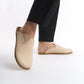 Gentle cream leather slip-on shoes for women, crafted with a natural cork sole for excellent arch support. These durable and eco-conscious shoes are ideal for casual outings in the USA.