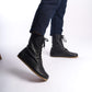 Men's black leather barefoot boots, side profile featuring a zipper detail, perfect for winter.