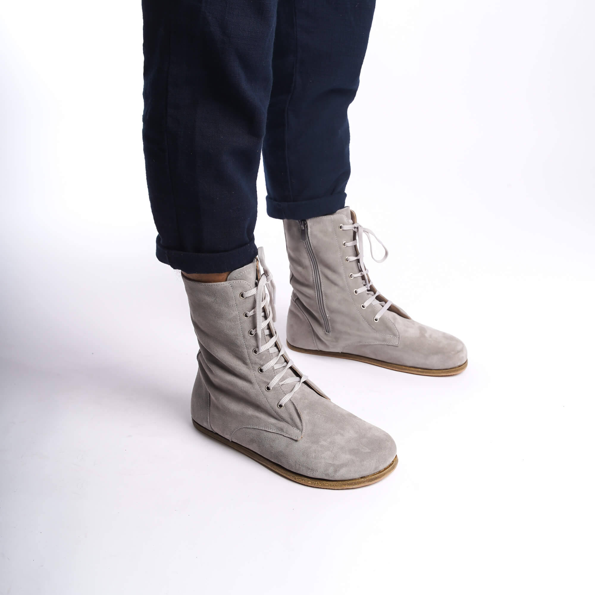 Side view of men's gray barefoot boots, showcasing the lace-up design and high-quality leather.