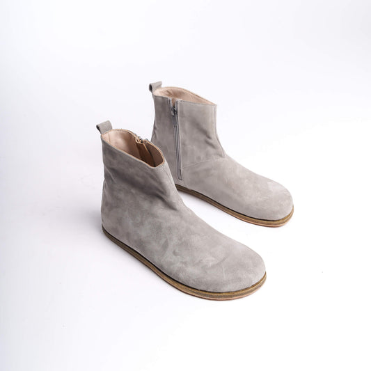Pair of gray ankle boots for men, crafted from genuine leather with a side zipper for a modern and comfortable fit.