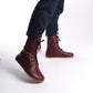 Burgundy leather barefoot boots for men, side profile showing the zipper and elegant design.