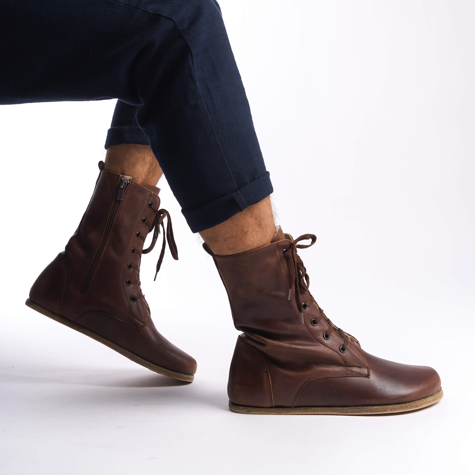 Men's brown genuine leather barefoot winter boots, featuring laces and a side zipper for easy wear.