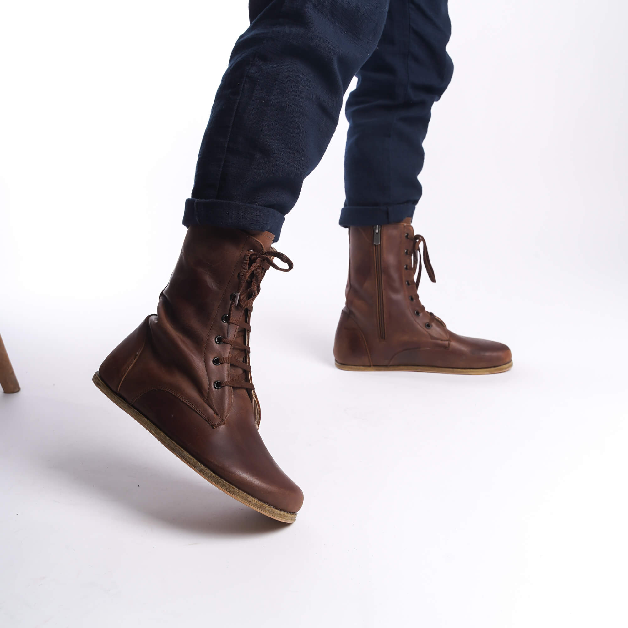 Brown leather barefoot boots for men, side profile showing the convenient zipper and stylish design.
