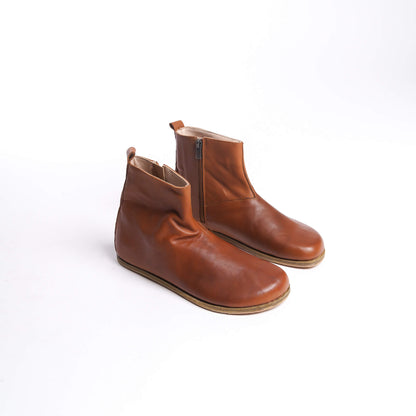 Pair of men's tan brown ankle boots, made from genuine leather with a side zipper for a chic and comfortable fit.