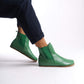 Men's green genuine leather slip-on Chelsea boots, featuring an elastic side panel for easy access.