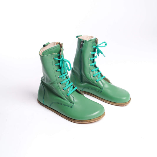 Pair of green barefoot men's winter boots made of genuine leather, with laces, fur inside and zipper closure.