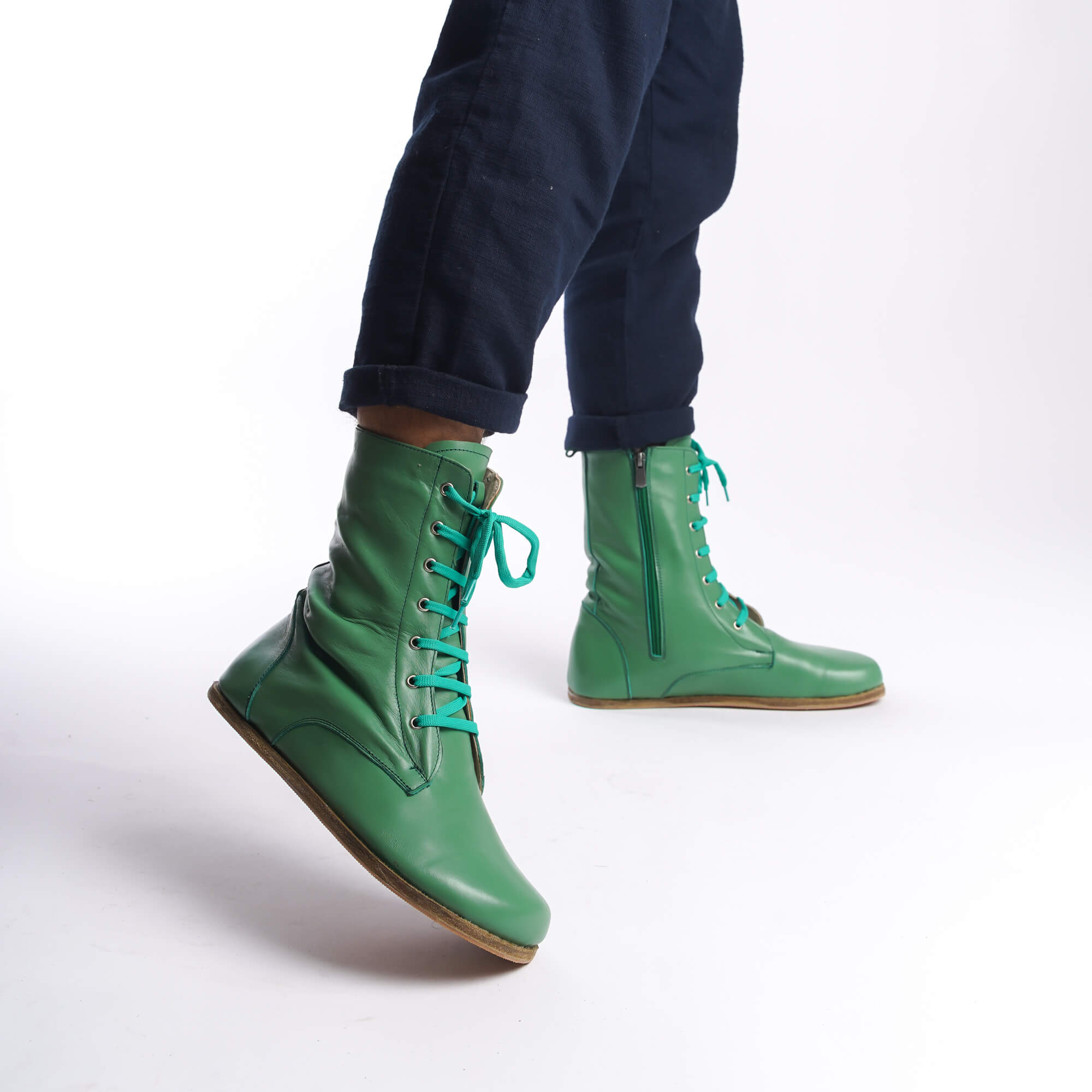 Green leather barefoot boots for men, side profile showing the convenient zipper and unique design.