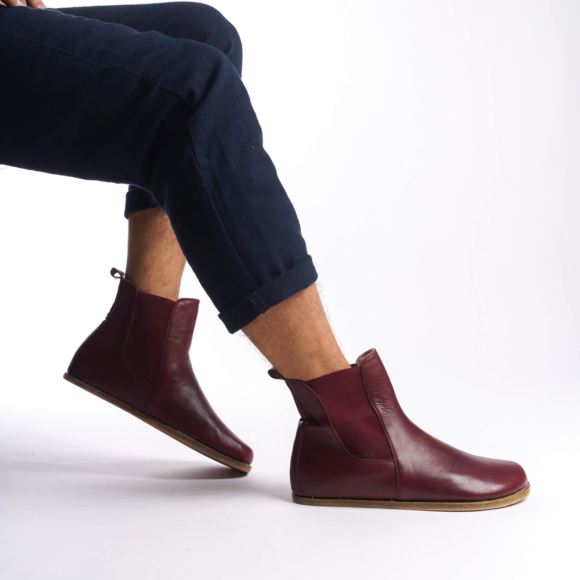 Men's burgundy genuine leather slip-on Chelsea boots, featuring an elastic side panel for easy wear.