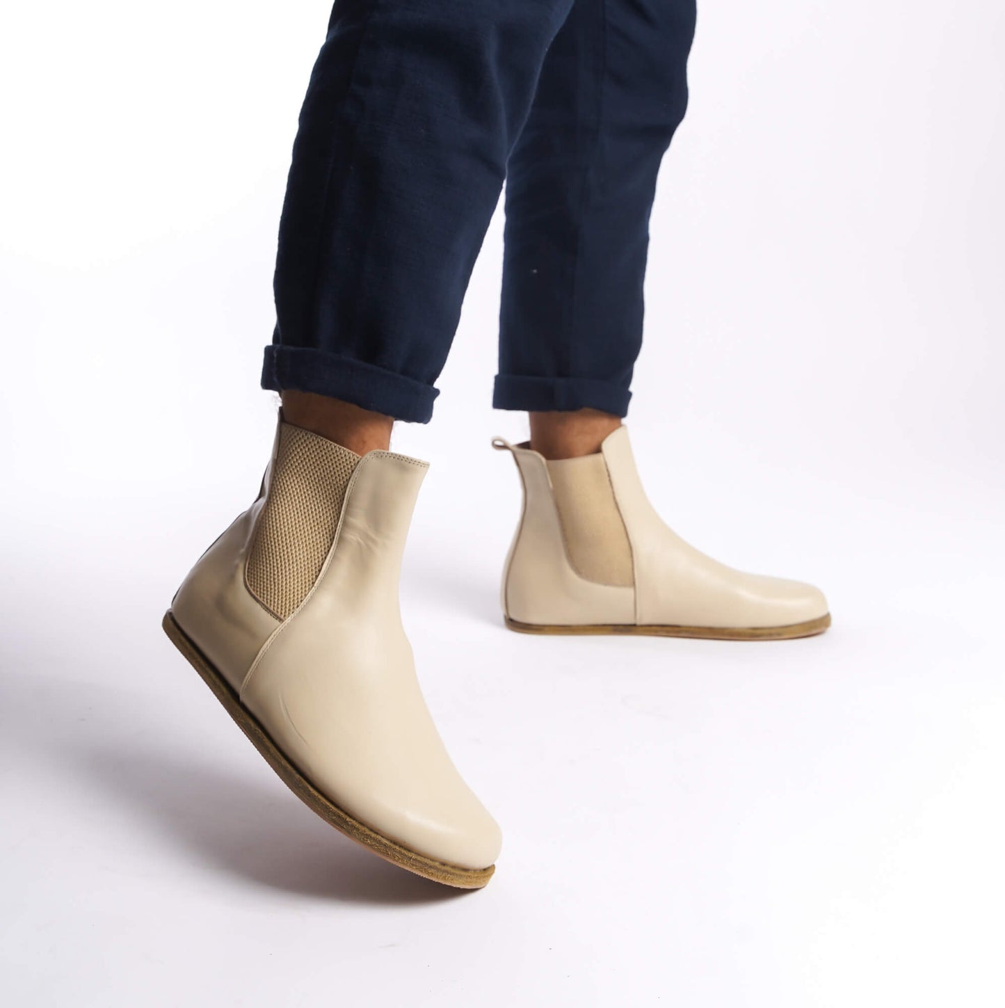 Beige-cream leather Chelsea boots for men, ideal for versatile wear, with a convenient slip-on design.