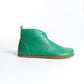 Stylish green barefoot leather boots with minimalist design and zero-drop sole, promoting healthy and natural walking experience for US market.