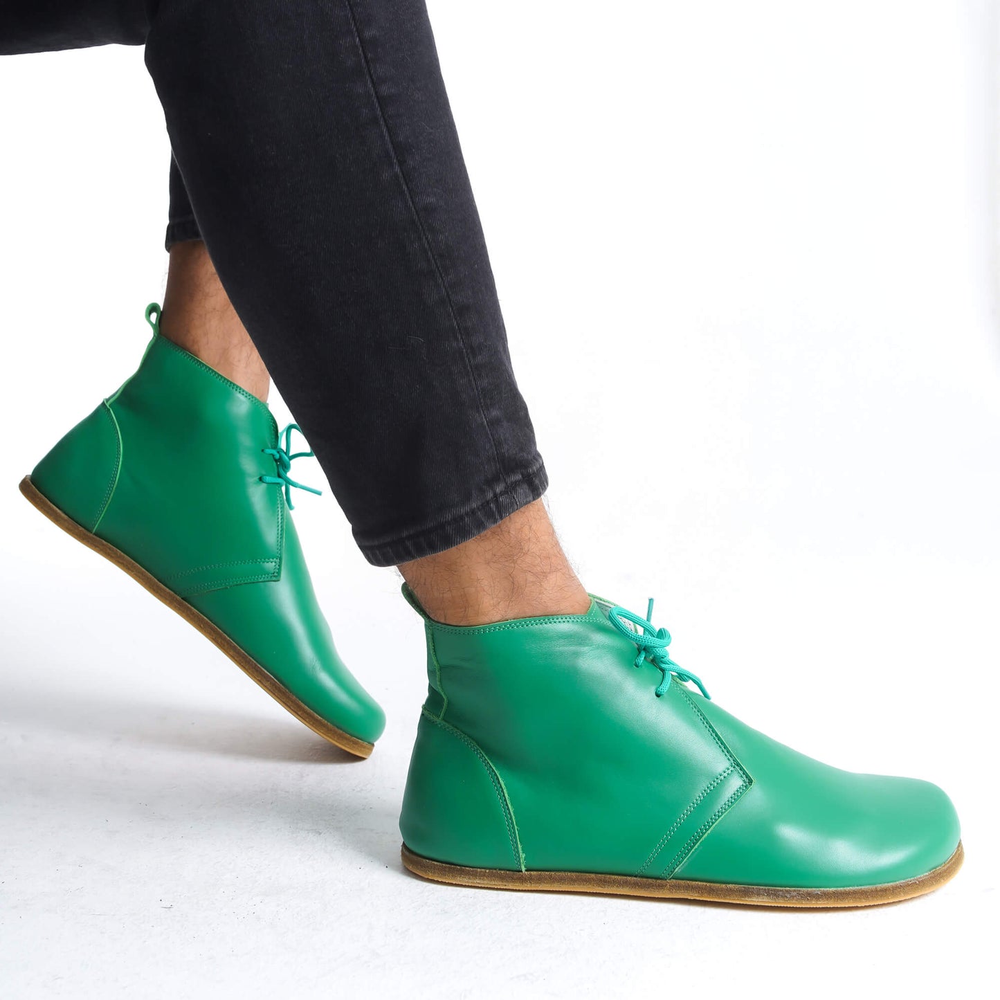 Green barefoot leather ankle boots with flexible zero-drop design, ideal for health-focused, minimalist lifestyle and everyday wear.