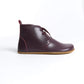 Stylish burgundy barefoot leather boots with minimalist design and zero-drop sole, promoting healthy, natural walking for the US market.