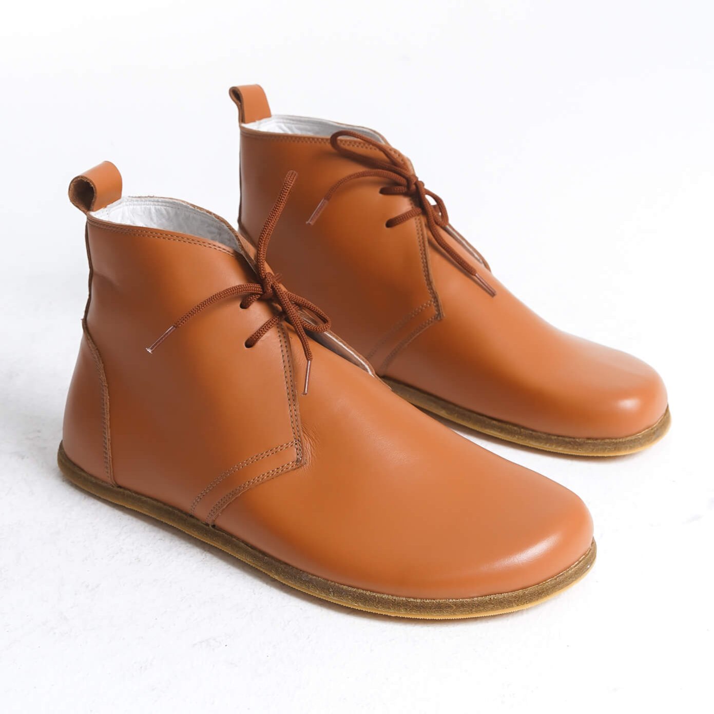 Step into nature with our handcrafted, tan leather boots. Feel the comfort and style of the outdoors, every step of the way. #tanleather #handmade #comfort #style