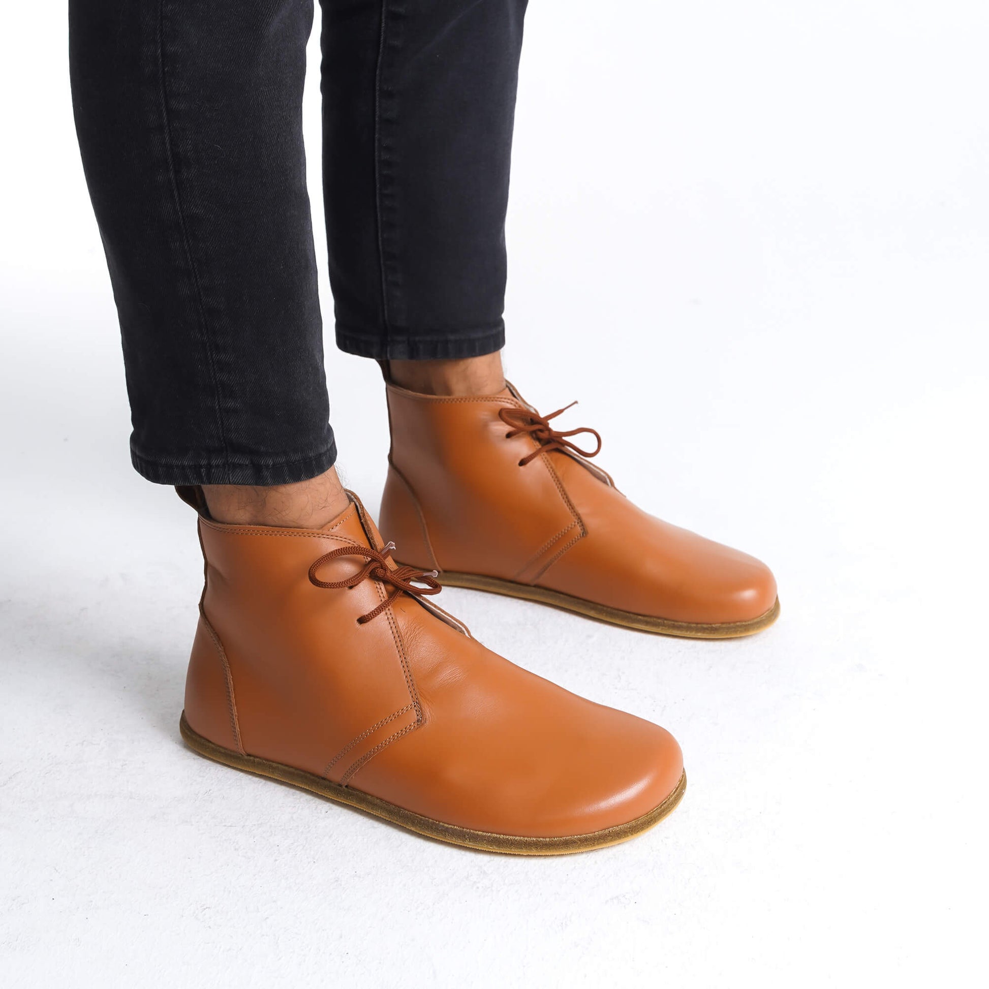 Versatile and stylish, our tan leather boots are perfect for any occasion. From casual outings to formal events, these boots will elevate your look. #versatile #leather #comfort #style