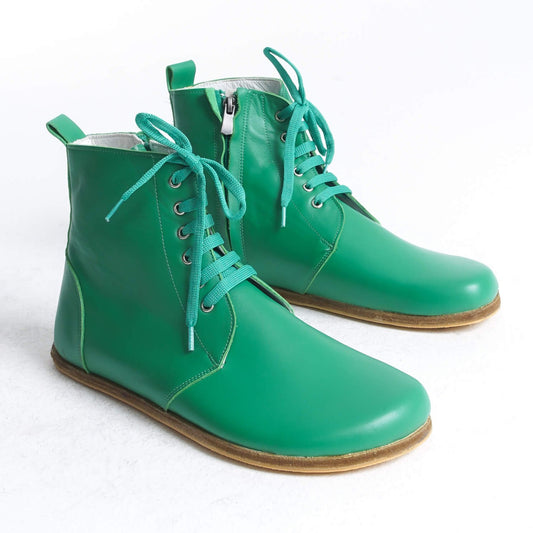 Vibrant green barefoot winter boots designed with a zero-drop sole for natural foot alignment. Crafted from high-quality leather, these boots offer both style and comfort for all your winter adventures.