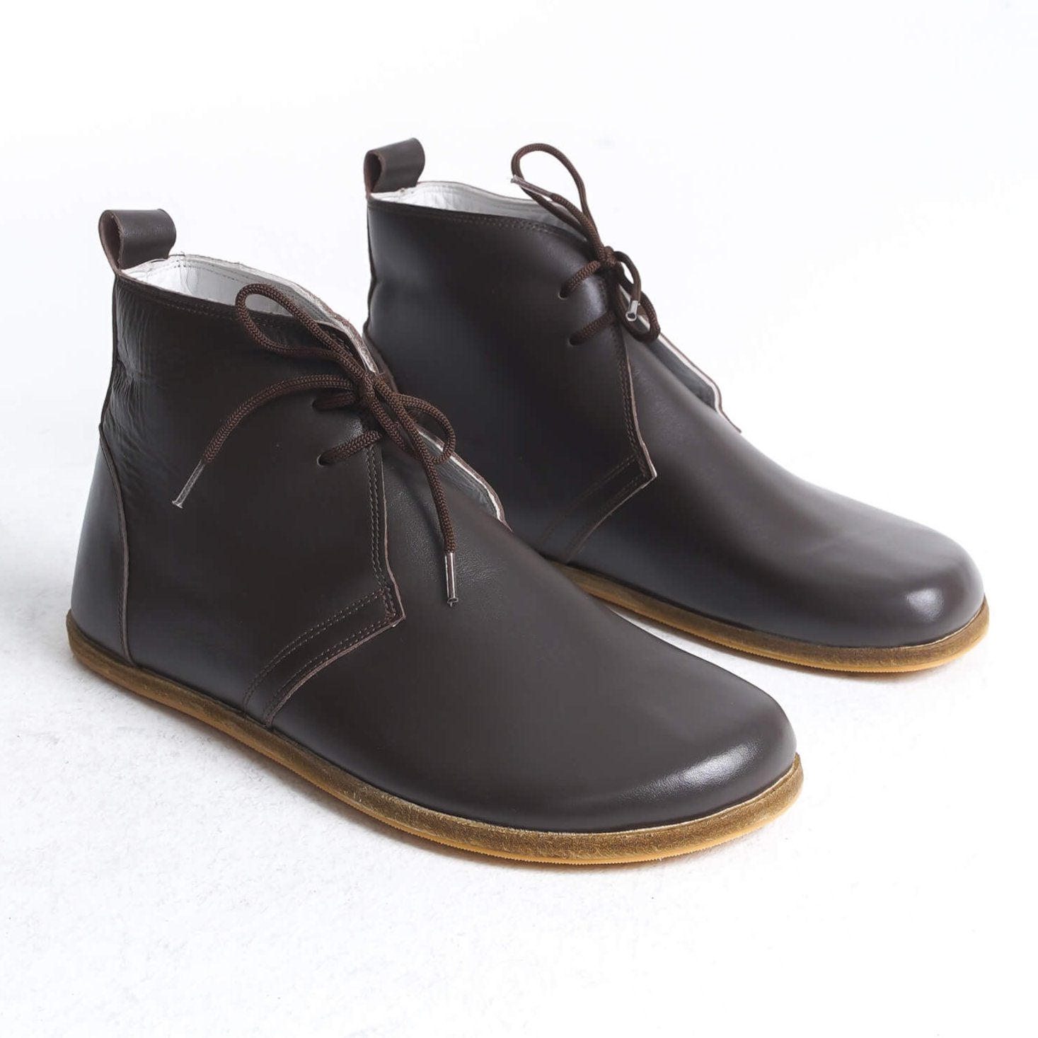 Experience barefoot luxury with our handcrafted leather boots. Designed for maximum comfort and style, these boots are perfect for everyday wear. #barefoot #leatherboots #comfort #style