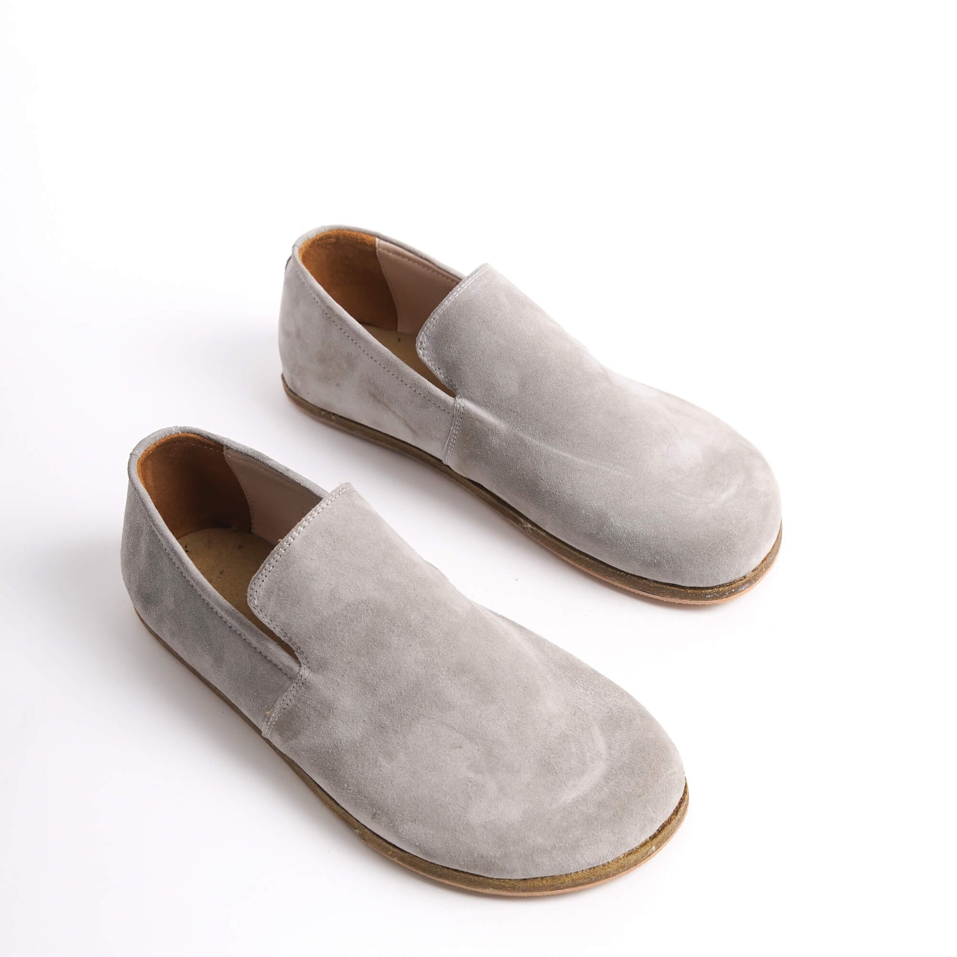 Gray suede Aeolia Leather Barefoot Men's Loafers with a wide toe box and minimalist design, perfect for comfort and style.