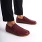 Ionia Leather Barefoot Men's Loafers in burgundy displayed on a white background, showcasing their minimalist design.