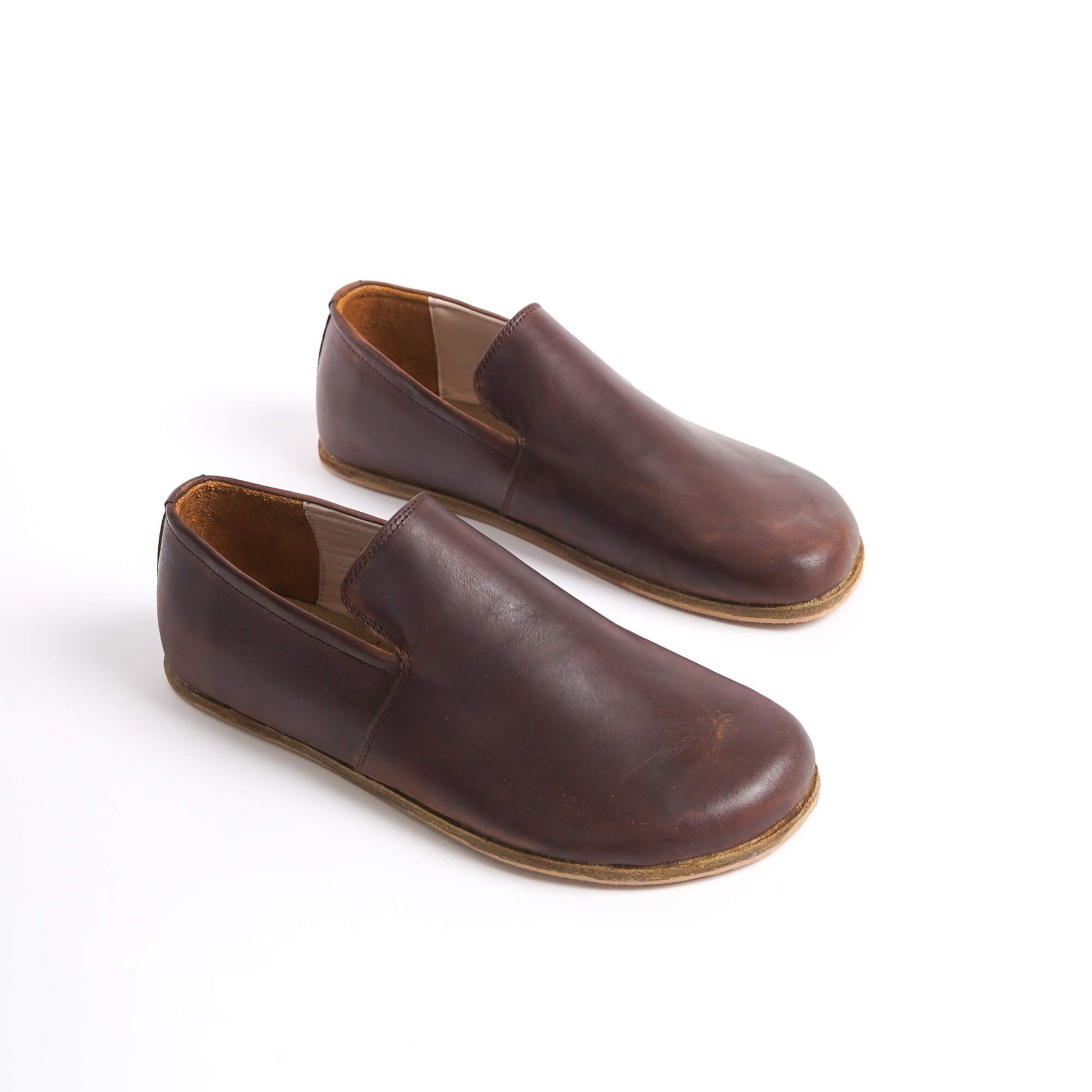 Aeolia leather barefoot men loafers in brown - top view, showcasing genuine leather and minimalist design for natural foot movement. Shop at pelanir.com!