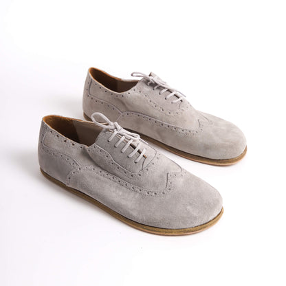 Elegant gray suede barefoot Oxfords with brogue details for men – stylish and comfortable.