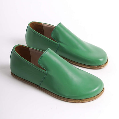 Green Aeolia Leather Barefoot Men's Loafers with a minimalist design and wide toe box, perfect for style and comfort.