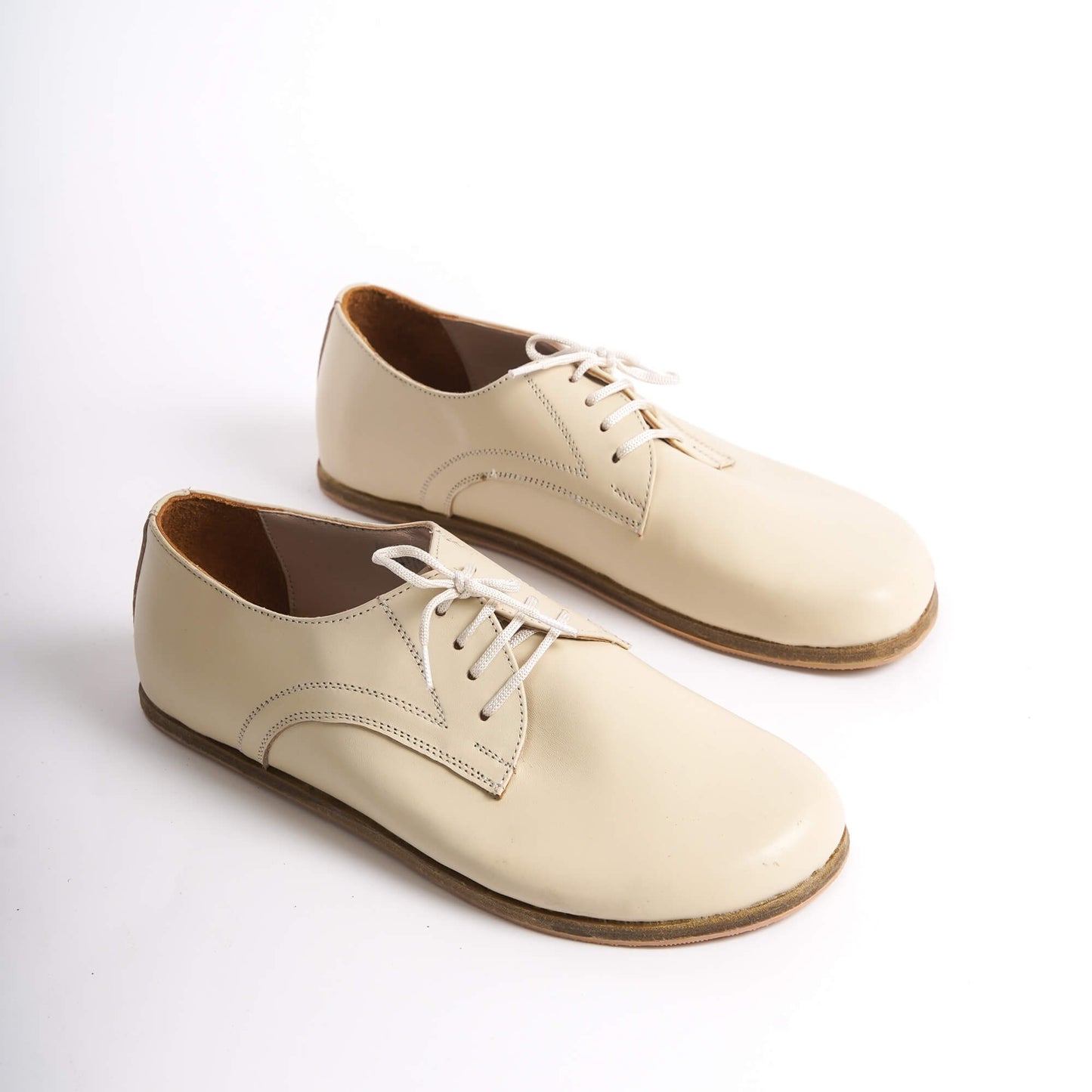 Elegant beige Locris Leather Barefoot Oxfords for women – minimalist and stylish design.