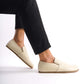 Side view of Ionia Leather Barefoot Men Loafers in beige on a white background, showcasing the minimalist design and natural leather material.