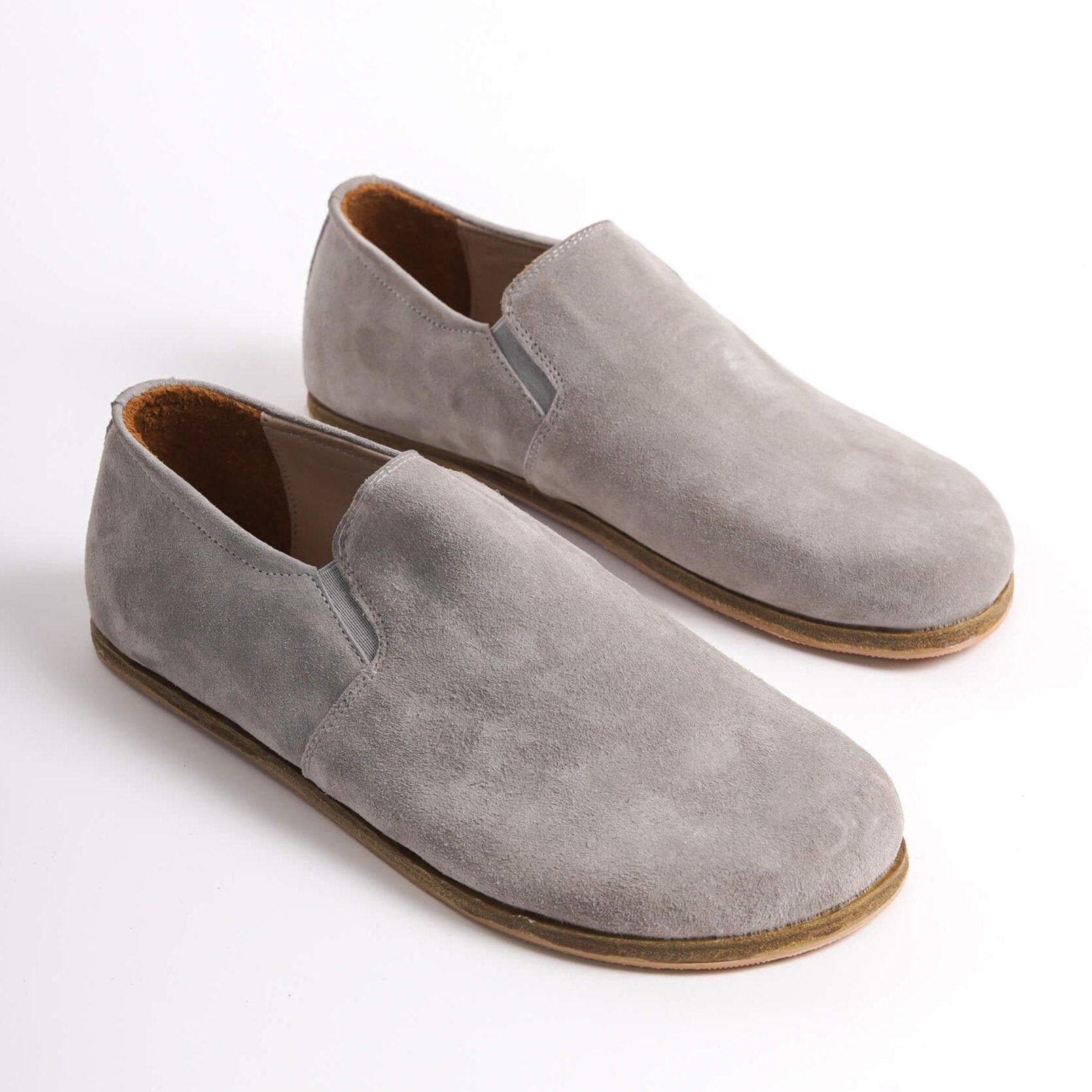 Gray Suede Ionia Leather Barefoot Men's Loafers on white background, showcasing the minimalist design.